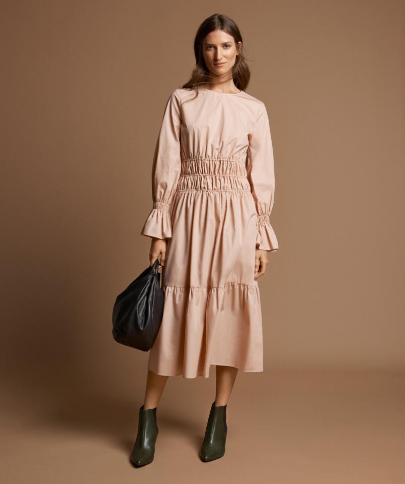  A peasant dress is no trailblazer but the flattering shape, with sleeves, will suit different shapes and ages. Dress, £65; boots, £69; bag, £89