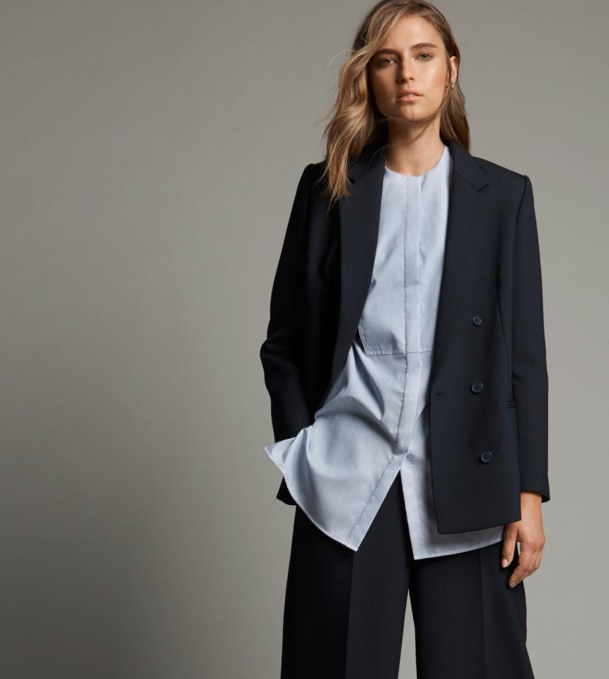  New boss Jill thinks blazers such as this will be a hit. Yes, it’s a wardrobe staple, but not a standout piece that will be a talking point for shoppers. Blazer, £129; shirt, £39.50; trousers, £79; earrings, £9.50