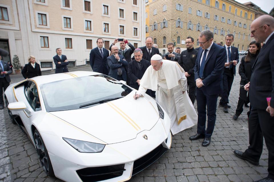  Sending it off for charity auction, the Pope's signature is expected to add to the value significantly