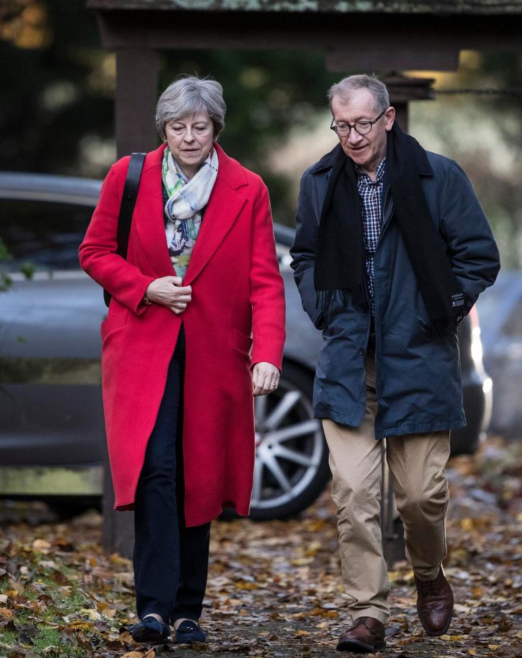  Theresa May, pictured today with husband Philip, has been sent a long memo by the pair of Brexiteers