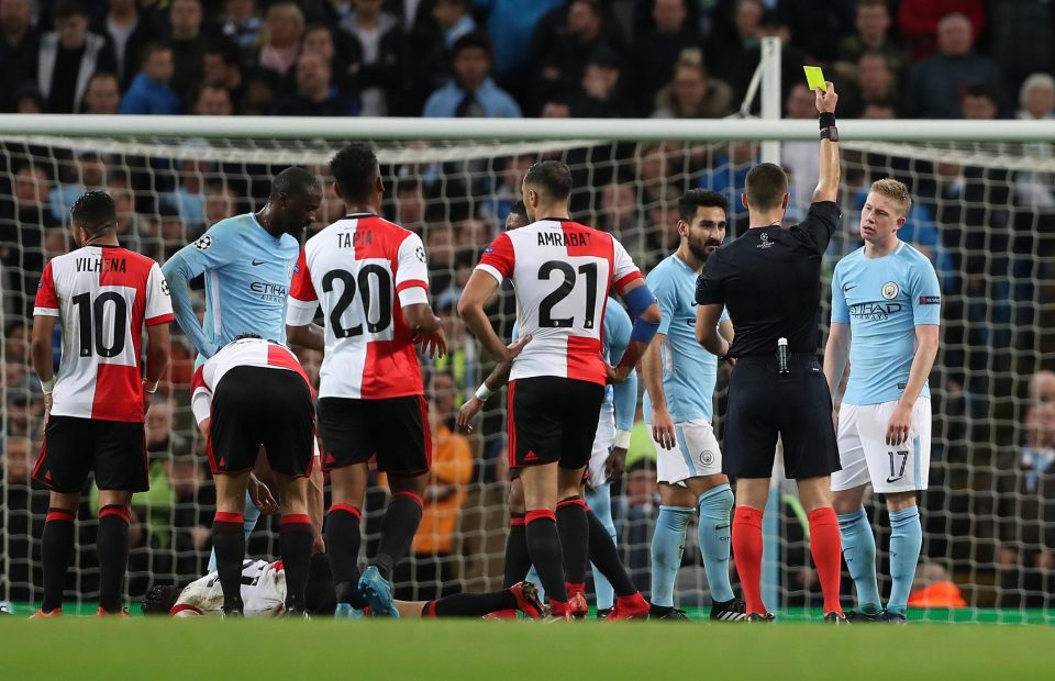 Kevin De Bruyne is shown a yellow card against Feyenoord