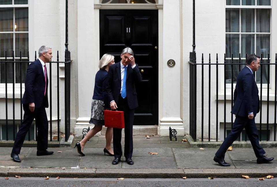  The Chancellor in front of his official Downing Street residence