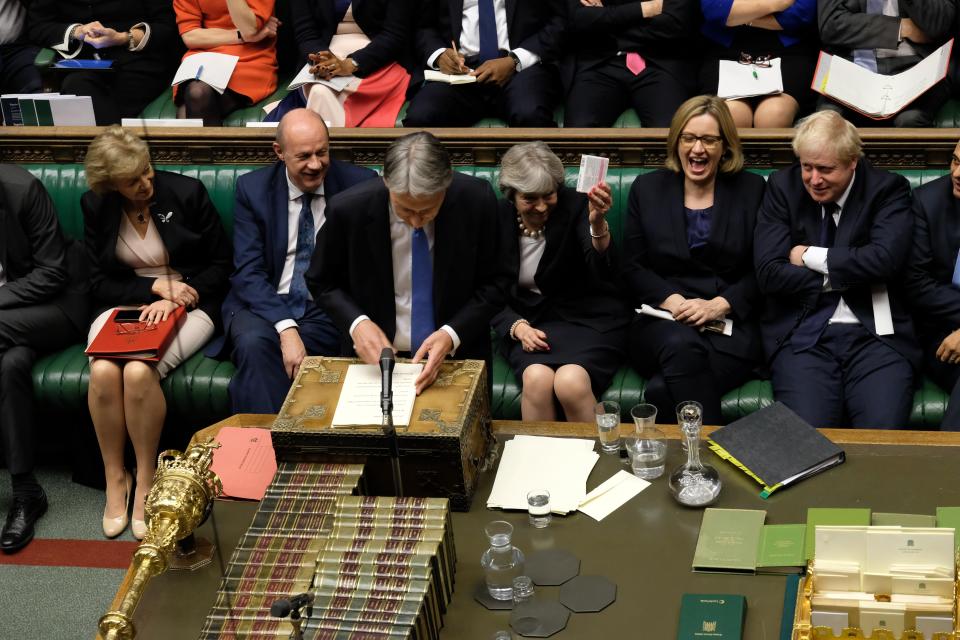  The PM handed Mr Hammond cough sweets in a jokey reference to her disastrous conference speech