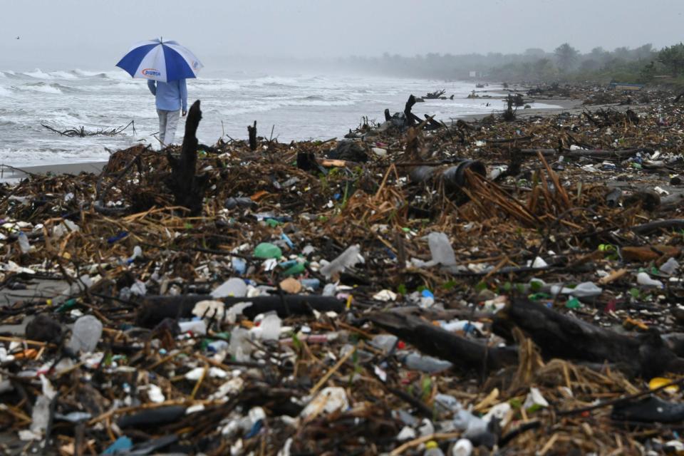 Plastic bottles, medicine containers and empty insecticide cans are among the deluge of waste