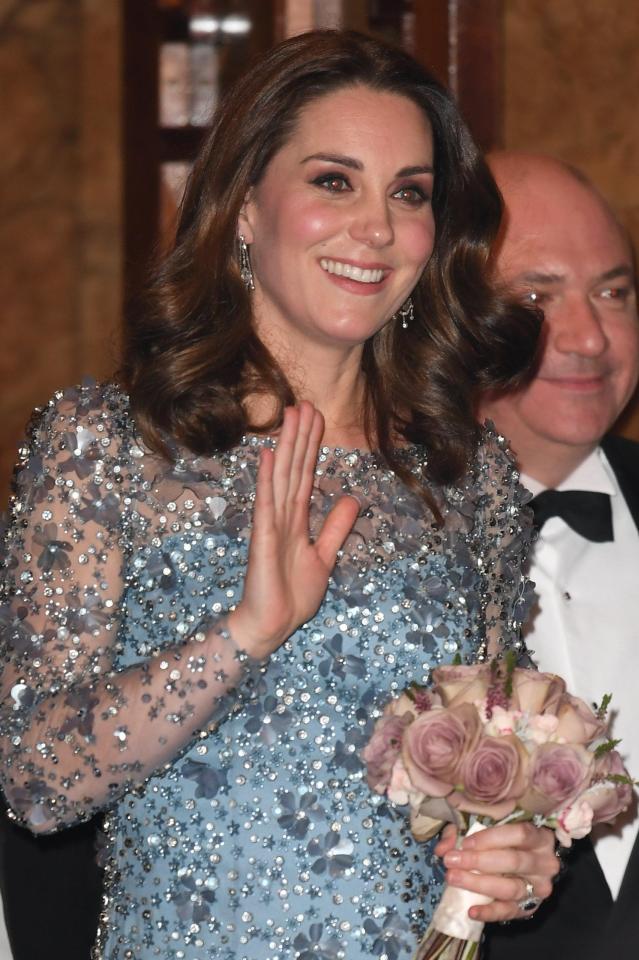  Kate Middleton's baby bump was hardly visible as she dazzled in the elegant gown