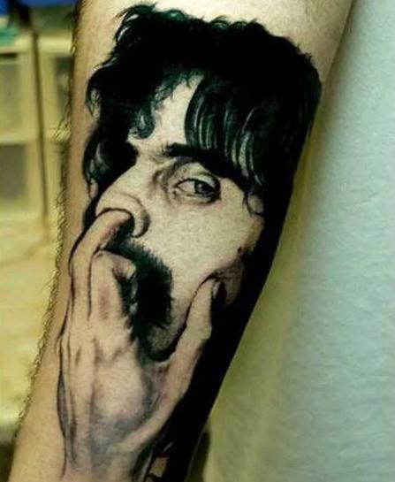  This is probably the naffest star portrait tattoo ever... oh and we THINK it's Serge off Kasabian