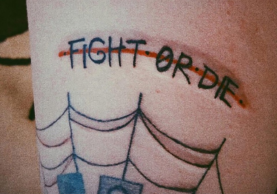 The 19-year-old has a 'fight or die' tattoo 