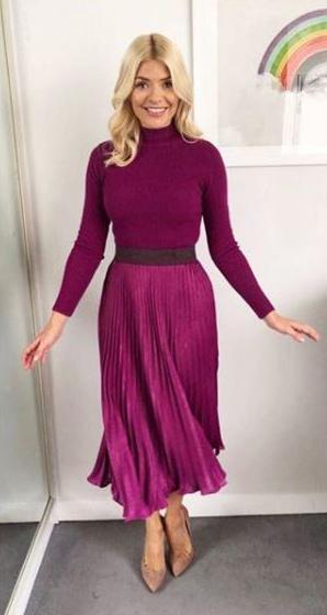  Fans are eager to copy Holly Willoughby's style. This M&S pleated skirt costs £49.50