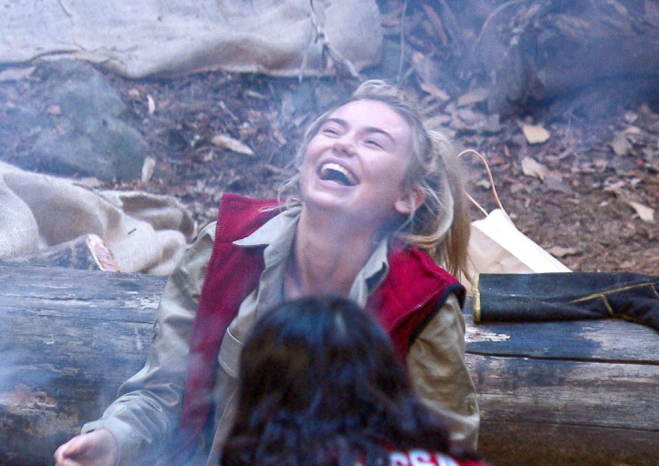  Toff giggles about her tumble in front of the camp fire