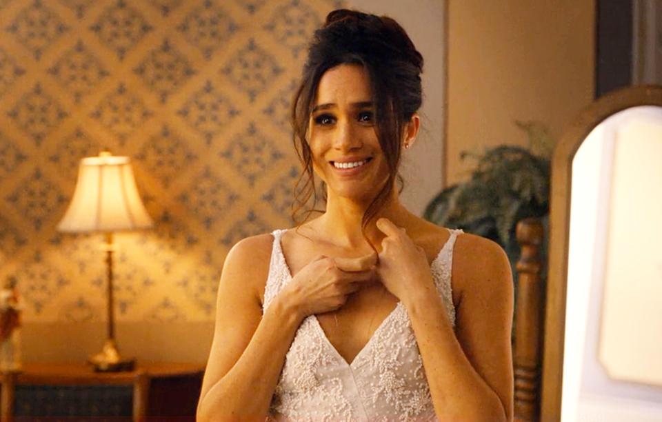  Meghan wore a stunning lace wedding gown when filming for Suits