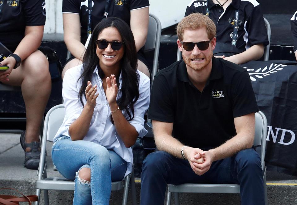  Meghan wore a Misha Nonoo 'Husband' shirt at the Invictus games