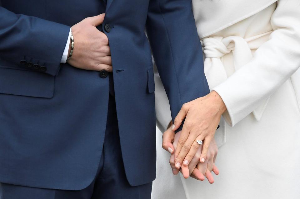 Meghan Markle showed off the stunning ring during a photo call at Kensington Palace last year