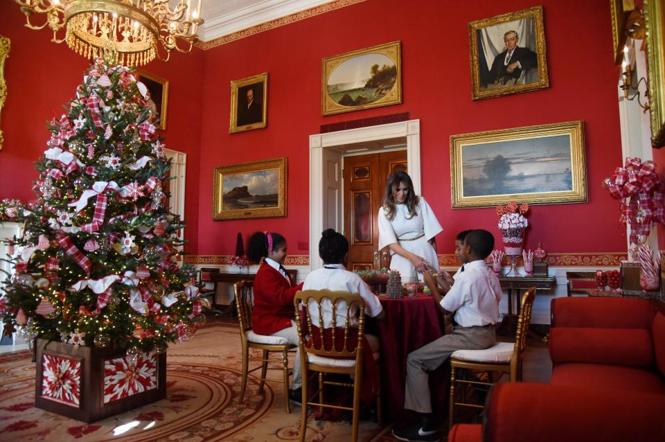  The First Lady prepares to hand out gifts to disadvantaged children