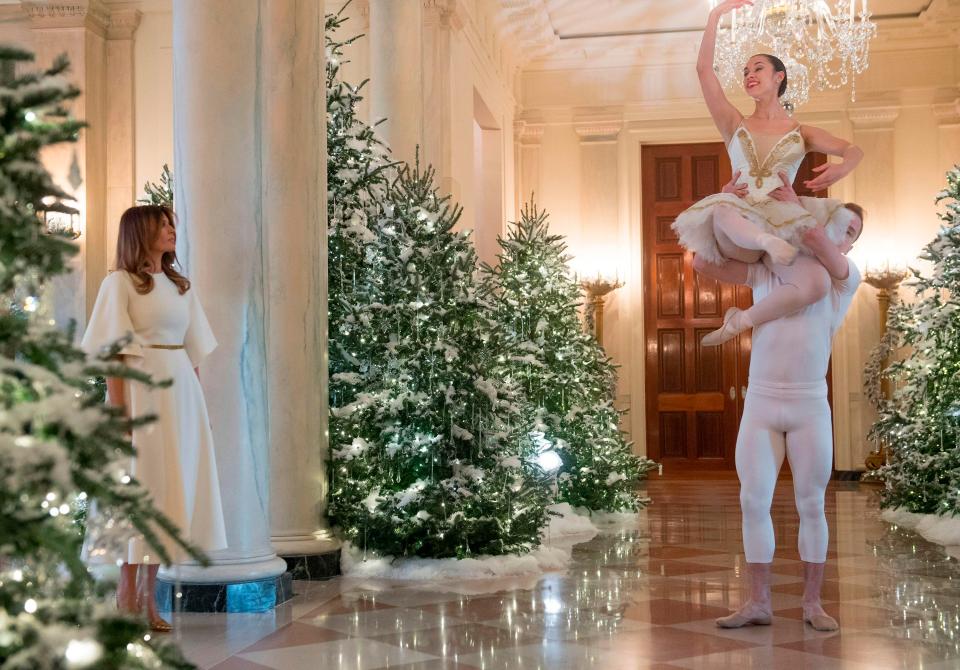  The impressed first lady watches a pair of ballet dancers