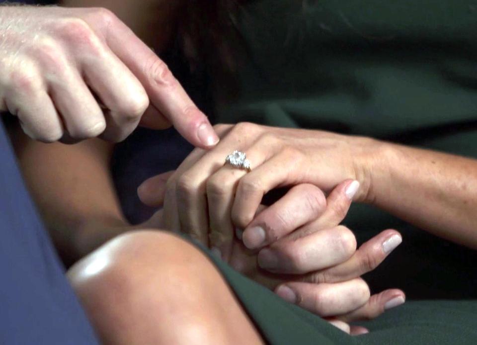  Harry designed Meghan's ring featuring two of Diana's diamonds