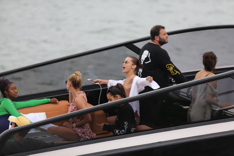  The girls relax on a speedboat off the coast of Miami