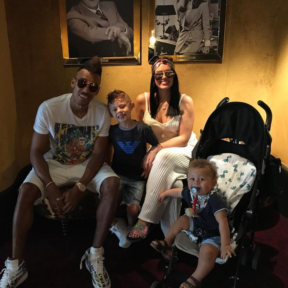 Pierre-Emerick Aubameyang poses with girlfriend Alysha Behague and his two children