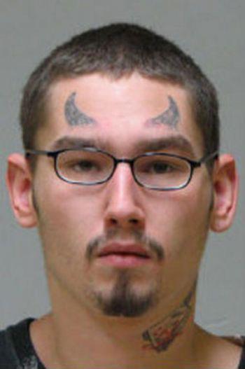  This guys devilish antics got him put away... and he has the mugshot to prove it