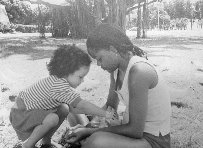  Meghan pictured as a toddler with mum Doria Radlan, an African-American yoga instructor and social worker