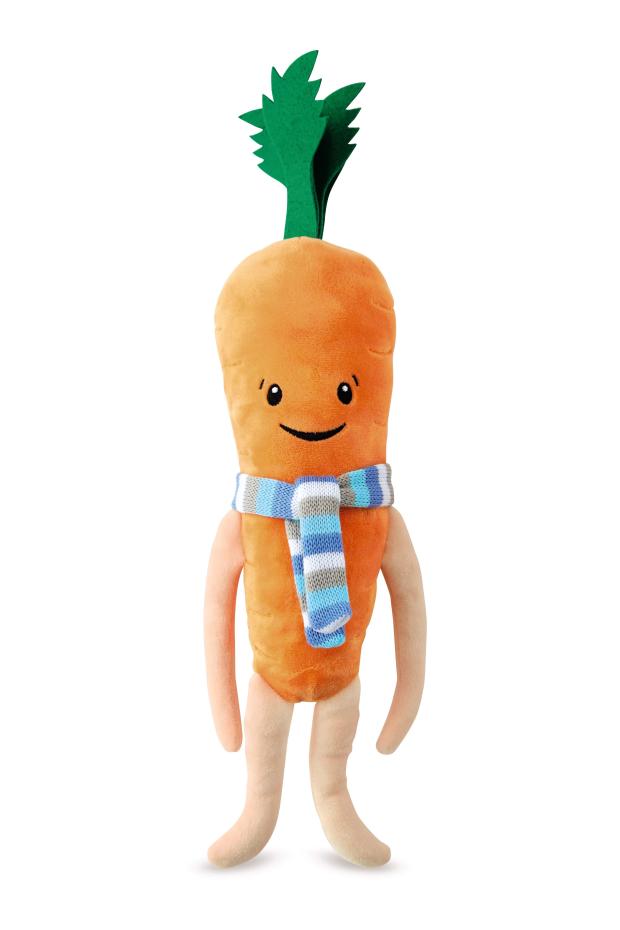 a stuffed carrot with a scarf around his neck