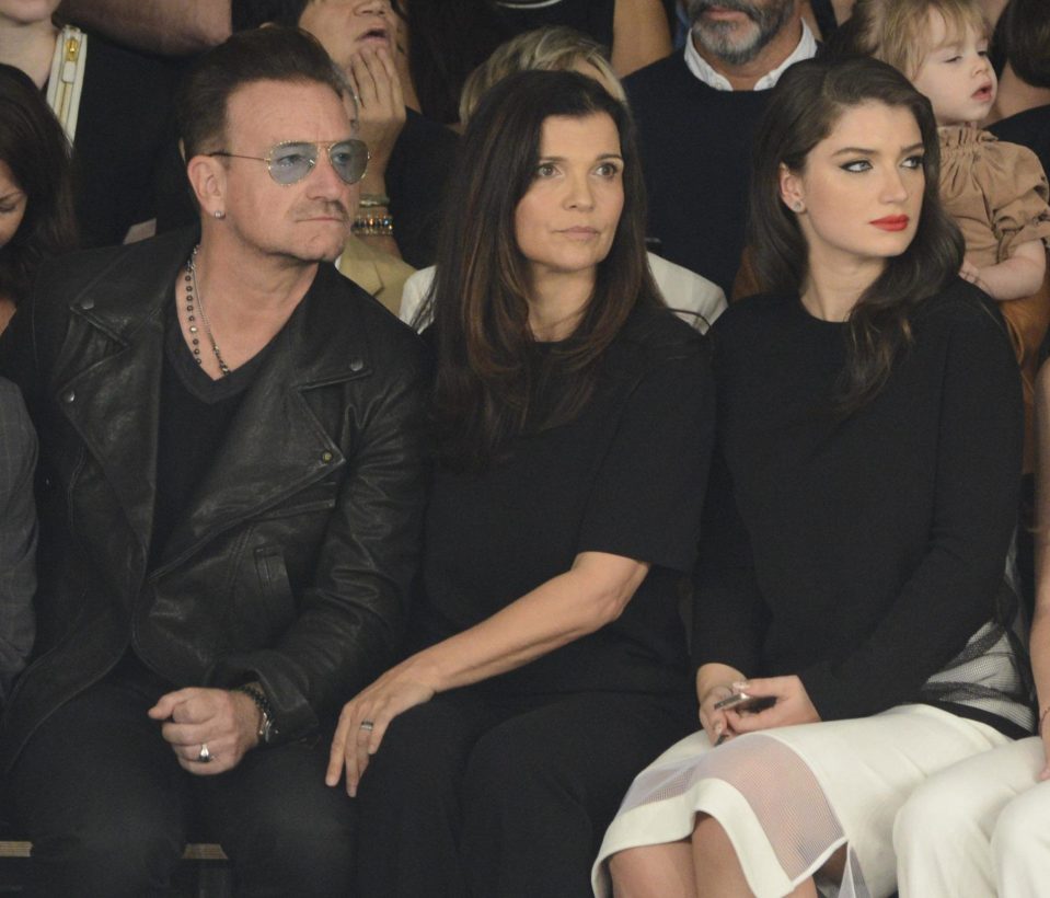  The singer with his wife Ali and daughter Memphis Eve Hewson at a fashion show in 2014