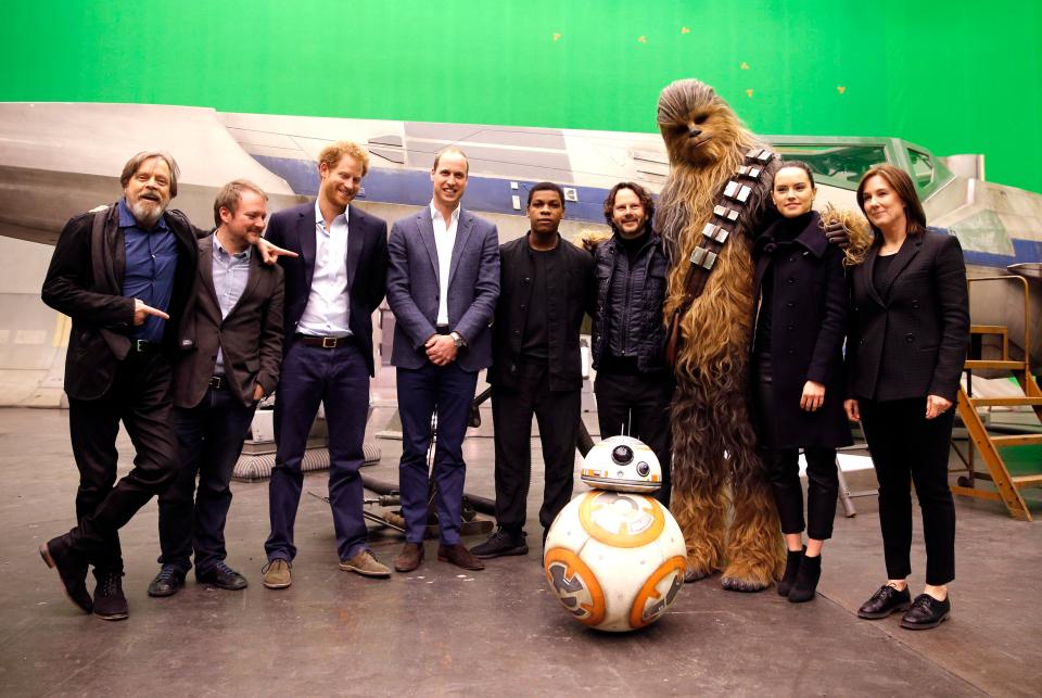  William and Harry posed with cast and crew