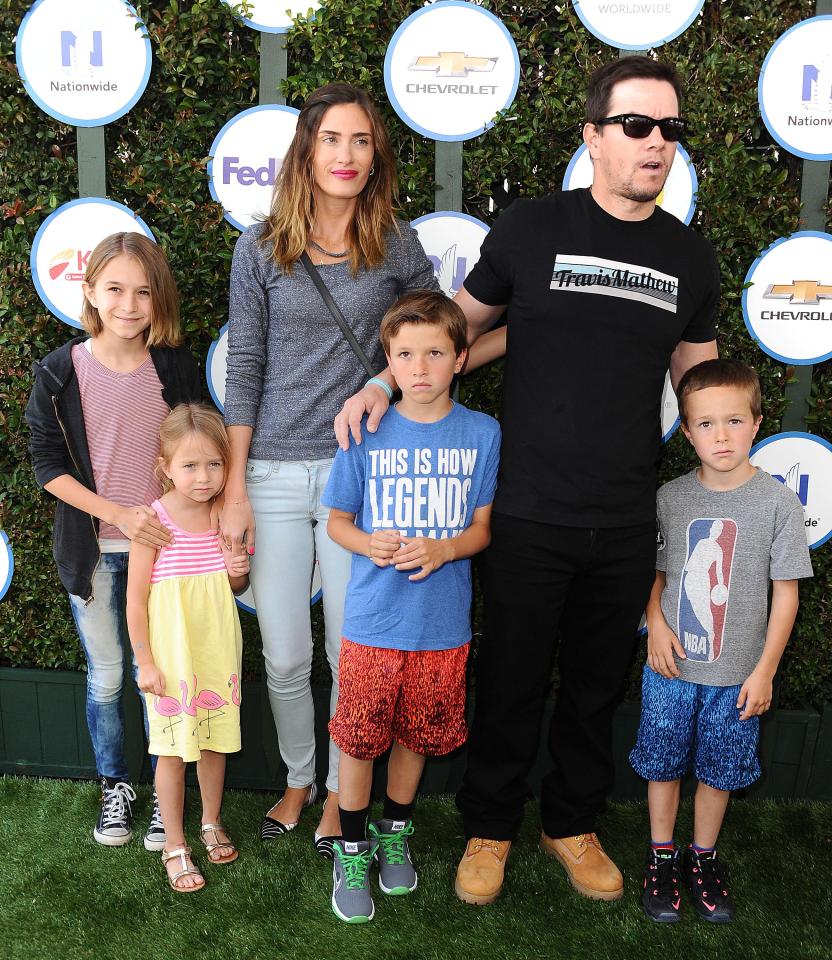  Mark with wife Rhea and their four children