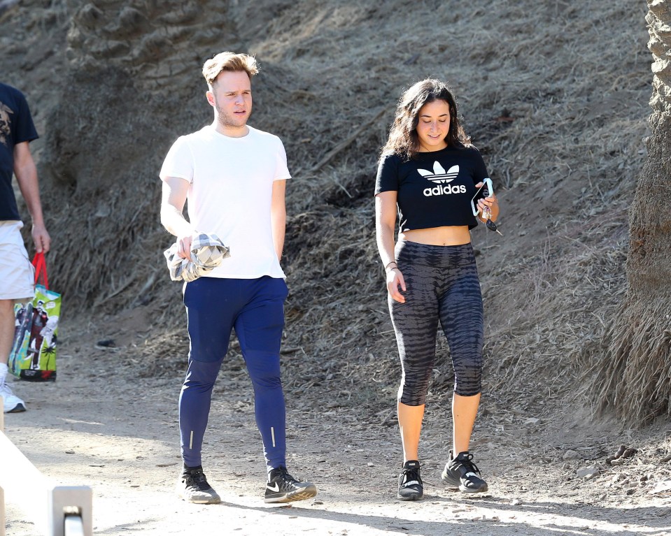 Olly was recently spotted taking a hike in LA with a mystery woman