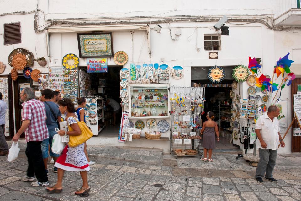  Locals explore Ostuni street and sample local markets and sights