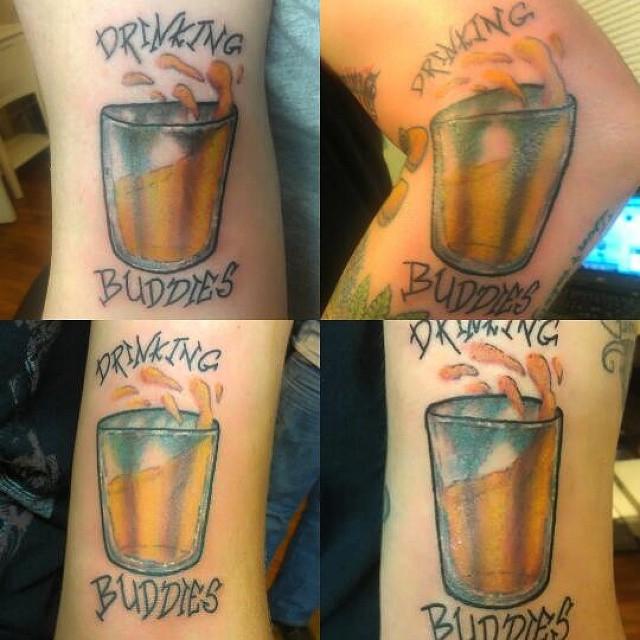  Four drinking buddies had their favourite beverage - an ice cold beer - inked on their arms