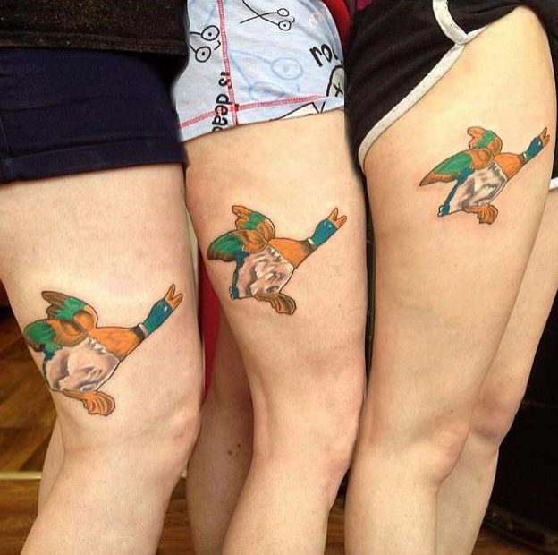  Three pals opted for matching flying geese designs on their thighs