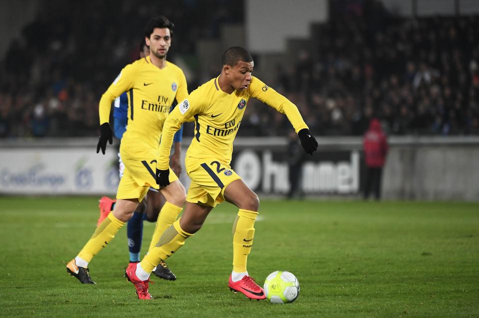  PSG star Kylian Mbappe charges forward with possession