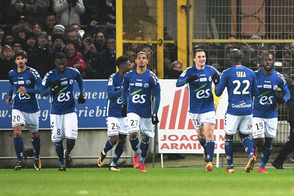  The home side celebrate their opening goal