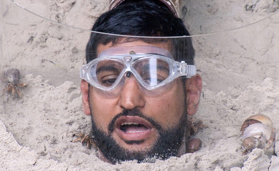  Amir was submerged in sand during one trial