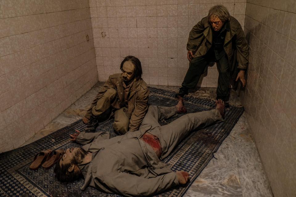  Wax dummies portray inmates in a shared cell in the Tehran prison