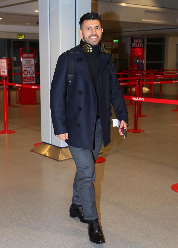 Sergio Aguero looked happy as he headed off to Ukraine for Wednesday's showdown with Shakhtar Donetsk