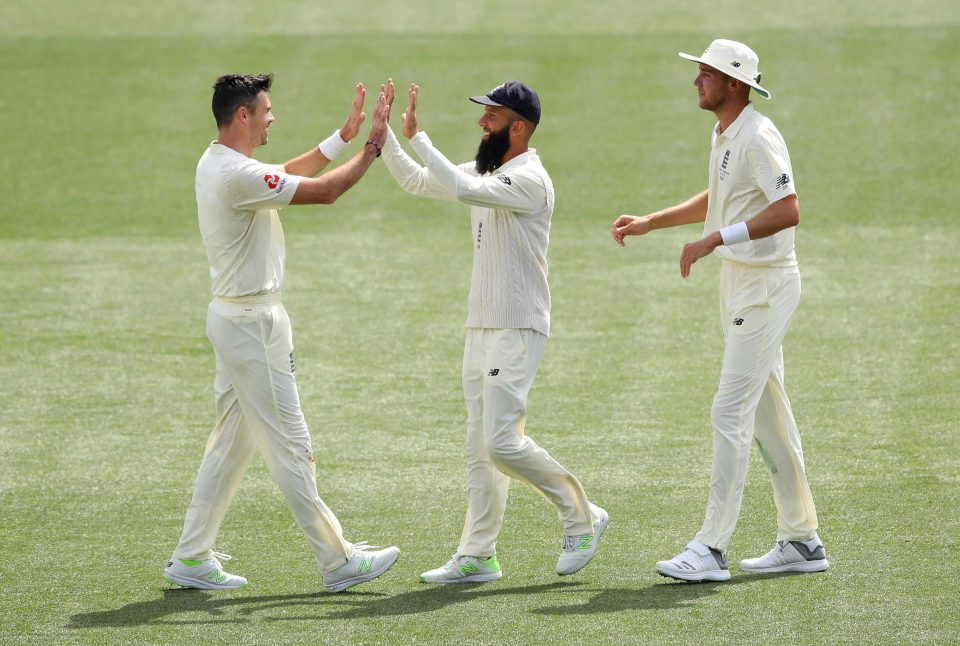  Moeen Ali celebrates with team-mate Jimmy Anderson after the wicket of Mitchell Starc in day four of the Second Test match