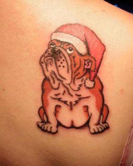  An animal lover had a dog with a Santa hat inked on her right shoulder