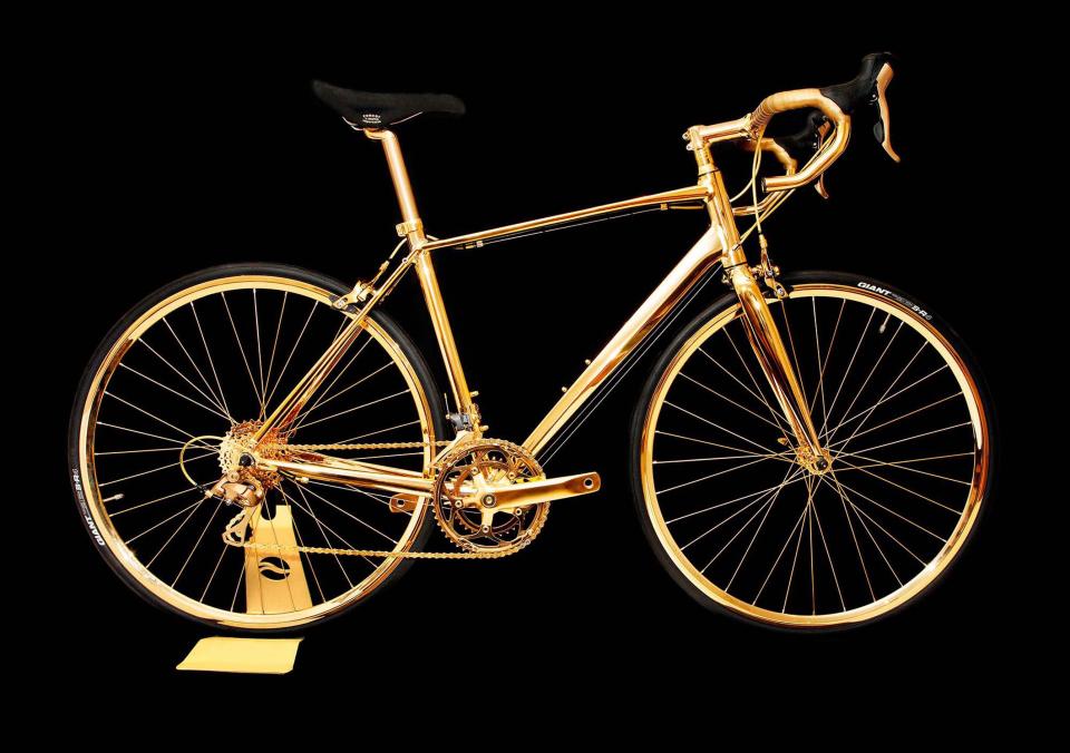  This racing bike has been dipped in 24 carat liquid gold and retails for £250,000