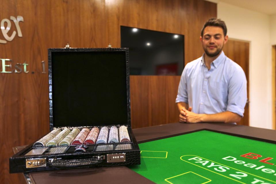  The poker set features chips encrusted with Swarovski crystals