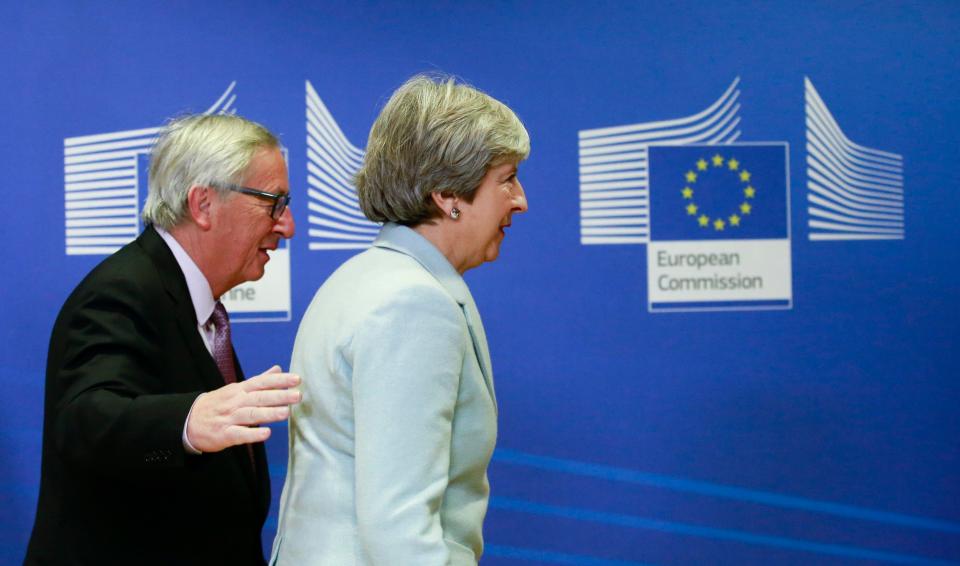  Theresa May with EU chief Jean-Claude Juncker during Brexit talks earlier this month