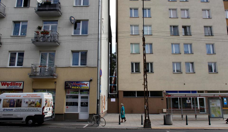  This narrow gap between two houses now holds a home - it is picture during the building stage