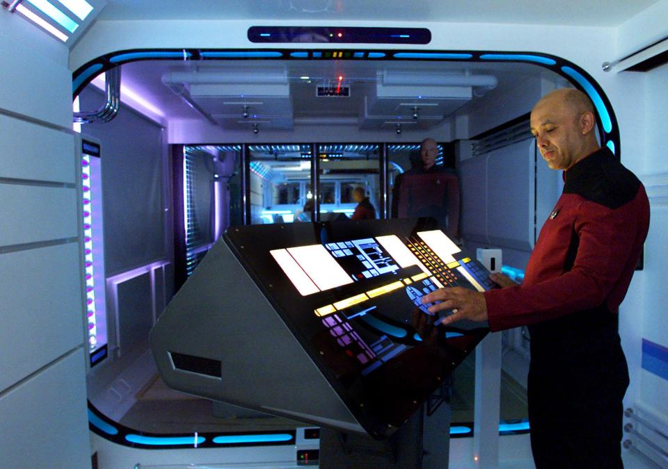  The previous owner stands proudly in his Star Trek uniform at the helm of his hi-tech home