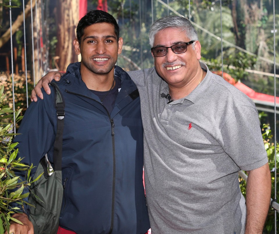 Amir poses with his dad after leaving the jungle