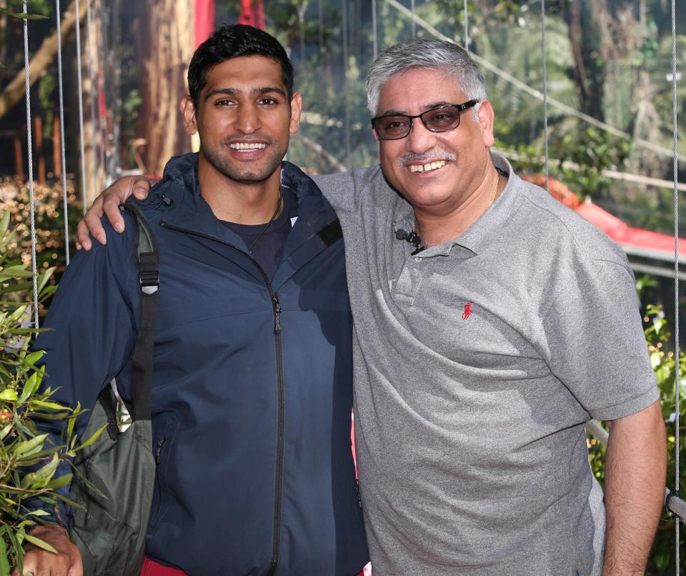  Amir poses with his dad after leaving the jungle