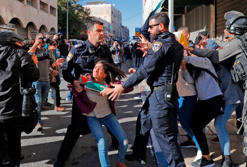  Israeli police disperse Palestinian protesters in East Jerusalem as the 'Day of Rage' carries on into Saturday