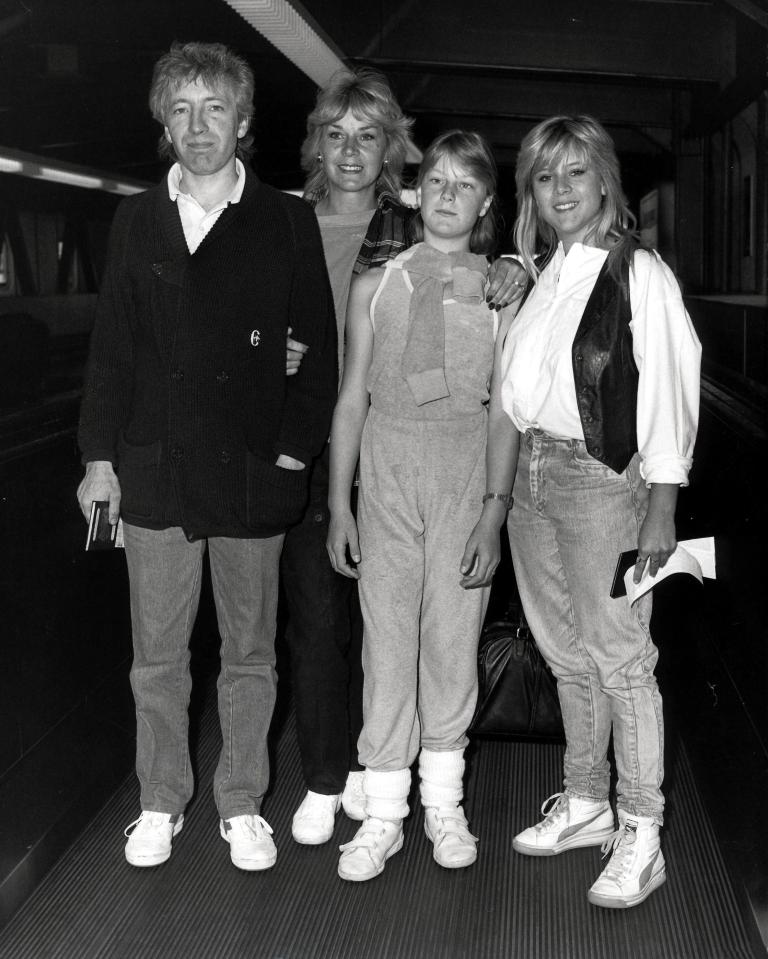  Sam with her sister and parents at Heathrow