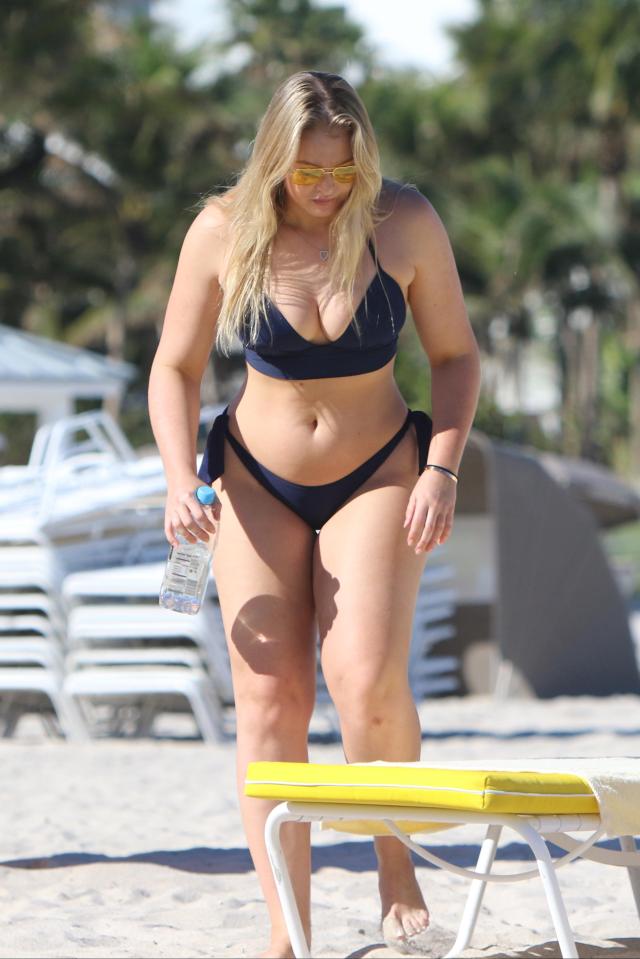  Iskra wore her long blonde hair loose around her shoulders