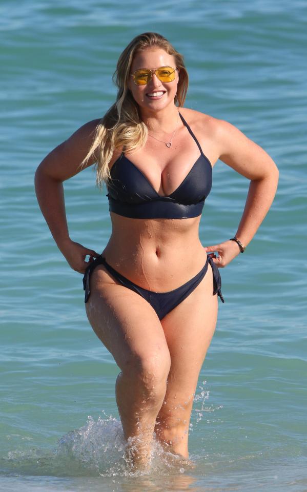  The blonde stunner looked incredible in her black bikini