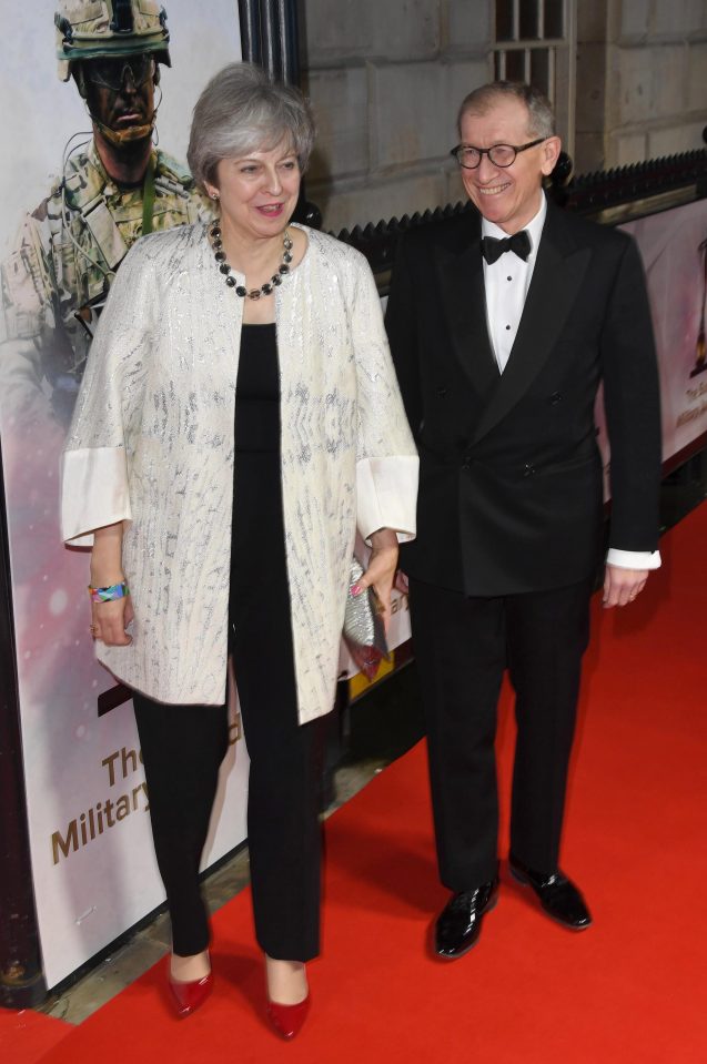  Theresa May with husband Philip at The Sun Military Awards as the vote was announced. Mrs May attempted to reassert control by sacking rebel MP Stephen Hammond from his role as Tory vice chairman